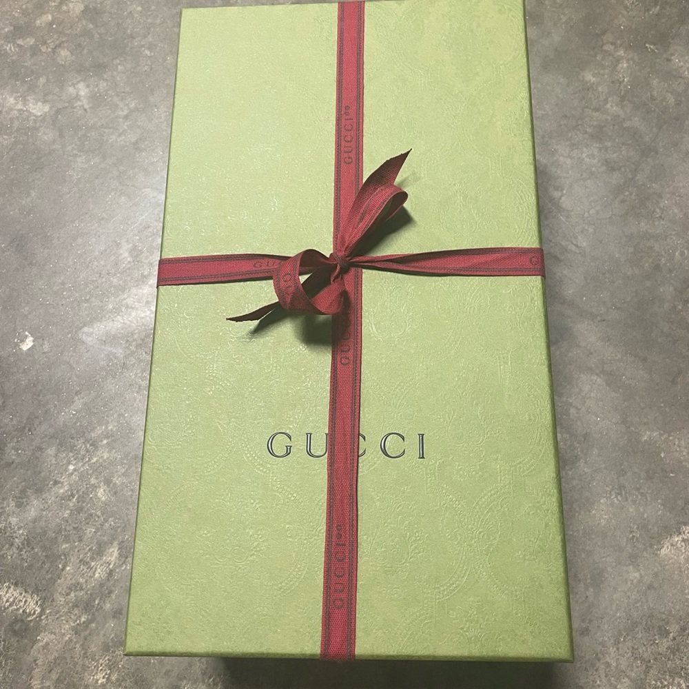 Gucci slides, black, men’s size 7, woman’s 8 - 8.5. Practically new!